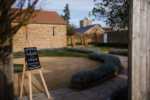 No-Corkage-Wedding-Venues-Dodford-Manor-Barn-Wedding-Venues-Midlands_Wedding-Ideas-Guest-Welcome_Emma-Matthew